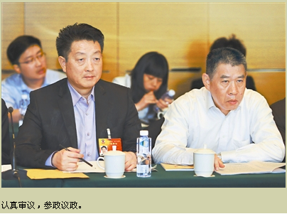 楊文龍董事長出席全國政協(xié)十二屆三次會議